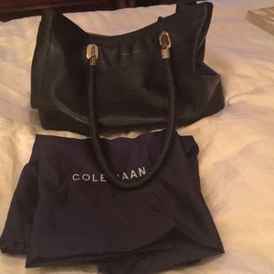 Cole Haan black leather purse.